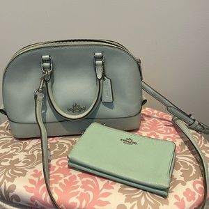 Coach mint satchel with matching wallet.